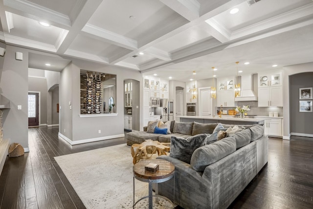 28203 Middlewater View Ln, Katy, TX 77494 - living room featuring arched walkways, coffered ceiling, baseboards, beam ceiling, and dark wood-type flooring