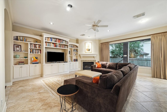 4436 Holt St, Bellaire, TX 77401 - living area with a ceiling fan, crown molding, a glass covered fireplace, and recessed lighting