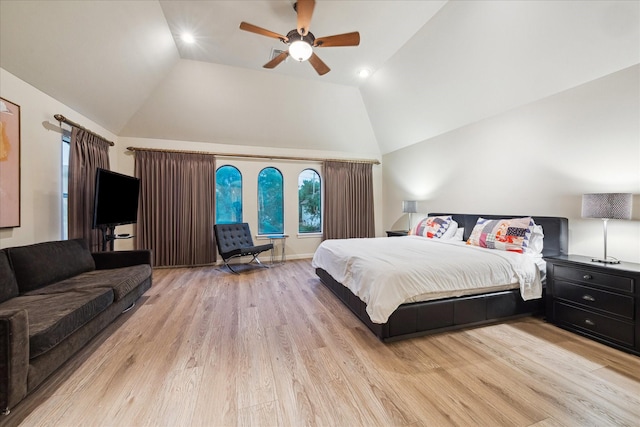 4436 Holt St, Bellaire, TX 77401 - bedroom with light wood-type flooring, high vaulted ceiling, and ceiling fan