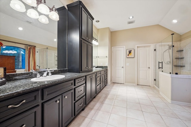 4436 Holt St, Bellaire, TX 77401 - full bathroom with a stall shower, tile patterned floors, lofted ceiling, double vanity, and recessed lighting