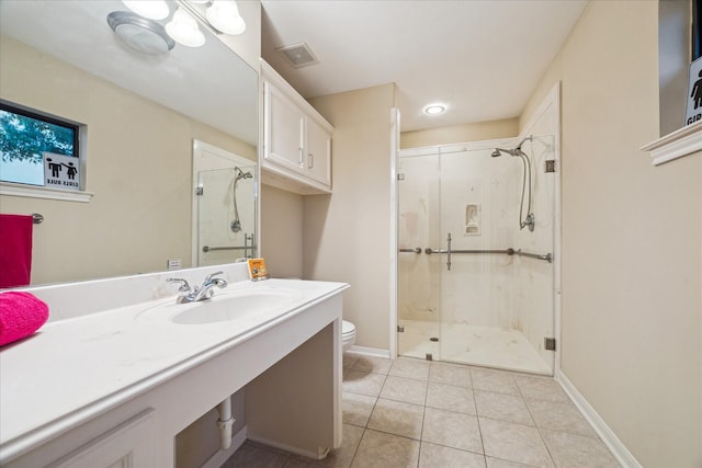 4436 Holt St, Bellaire, TX 77401 - full bathroom featuring a stall shower, toilet, tile patterned flooring, vanity, and baseboards