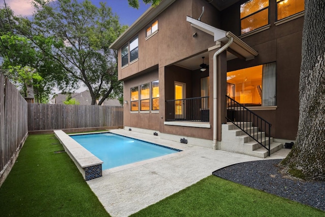 4436 Holt St, Bellaire, TX 77401 - view of swimming pool featuring a patio and ceiling fan