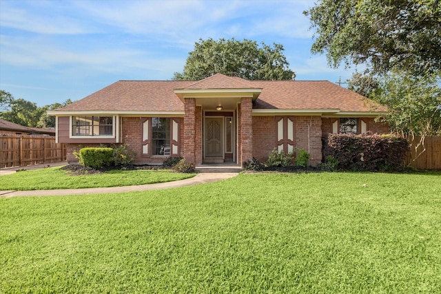 2302 Bright Meadows Dr, Missouri City, TX 77489 - view of front facade featuring a shingled roof and brick siding