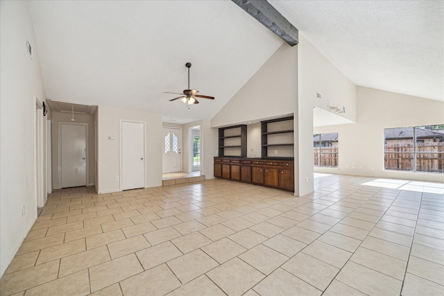 2302 Bright Meadows Dr, Missouri City, TX 77489 - unfurnished living room with high vaulted ceiling, attic access, ceiling fan, light tile patterned floors, and beamed ceiling