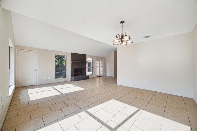 2302 Bright Meadows Dr, Missouri City, TX 77489 - unfurnished living room with a chandelier, lofted ceiling, a fireplace, and tile patterned floors