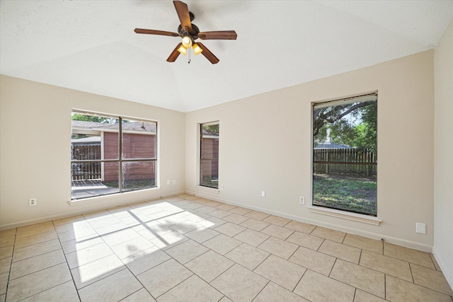 2302 Bright Meadows Dr, Missouri City, TX 77489 - unfurnished room featuring vaulted ceiling, a ceiling fan, light tile patterned flooring, and baseboards