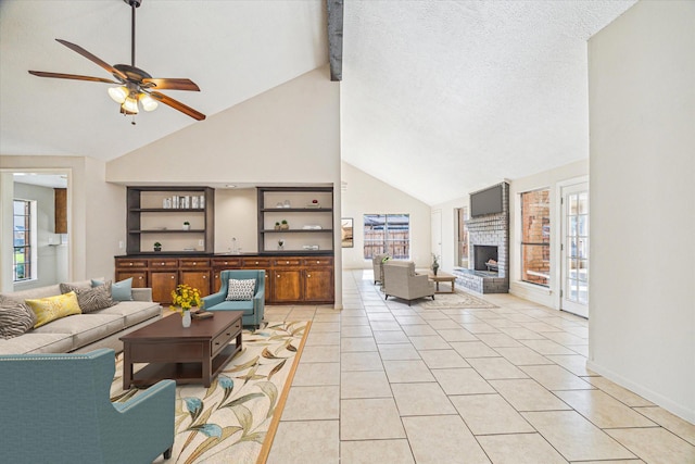 2302 Bright Meadows Dr, Missouri City, TX 77489 - living room with high vaulted ceiling, ceiling fan, plenty of natural light, a fireplace, and beamed ceiling