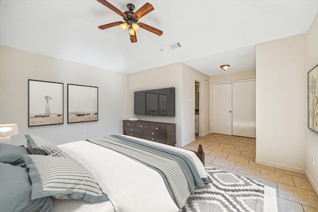 2302 Bright Meadows Dr, Missouri City, TX 77489 - bedroom with baseboards, vaulted ceiling, light tile patterned flooring, a closet, and ceiling fan