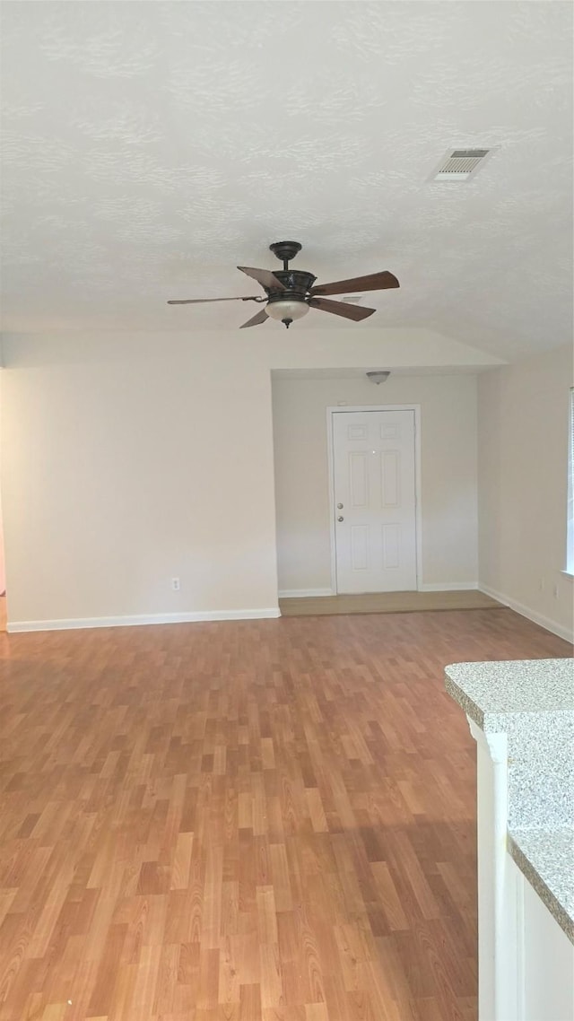 13418 Croquet Ln, Houston, TX 77085 - unfurnished room with a ceiling fan, baseboards, and light wood-type flooring