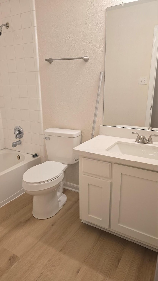 13418 Croquet Ln, Houston, TX 77085 - bathroom featuring wood finished floors, vanity, toilet, and  shower combination