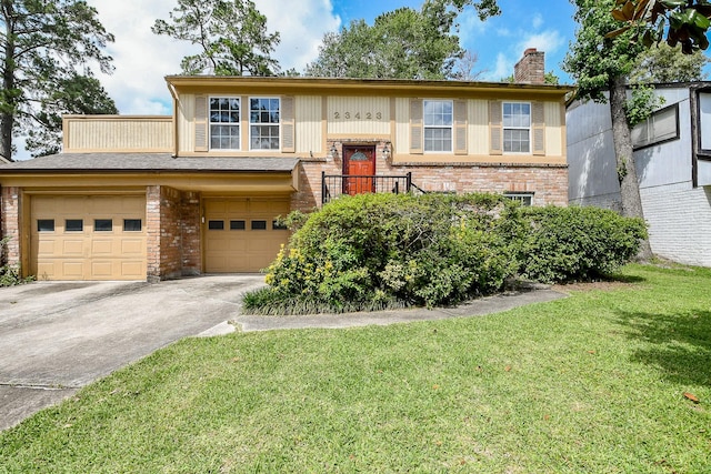 23423 Earlmist Dr, Spring, TX 77373 - split foyer home featuring brick siding, concrete driveway, a front lawn, and a chimney