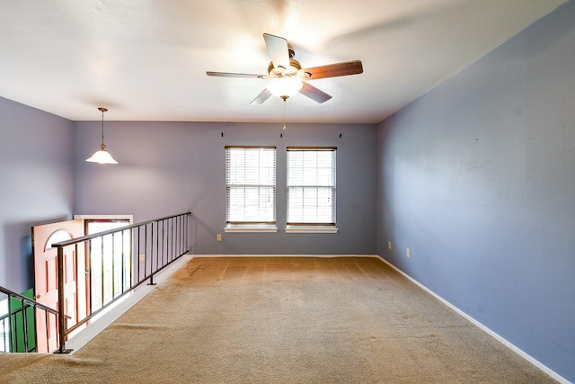 23423 Earlmist Dr, Spring, TX 77373 - spare room featuring a ceiling fan, carpet flooring, and baseboards