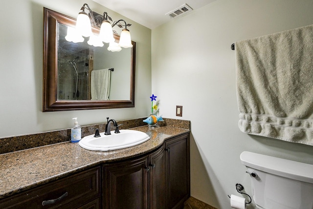 23423 Earlmist Dr, Spring, TX 77373 - full bathroom with vanity, toilet, a shower, and a chandelier