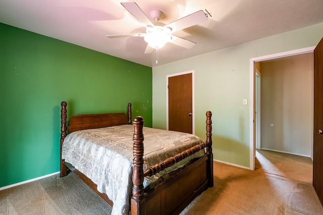23423 Earlmist Dr, Spring, TX 77373 - carpeted bedroom with baseboards, a ceiling fan, and a closet
