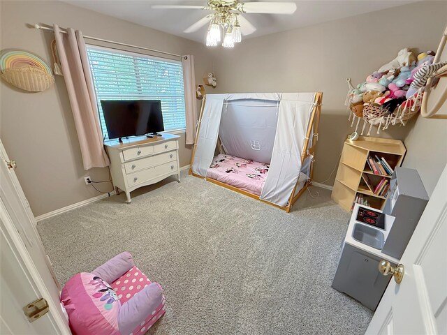 261 Colonial Cir, Athens, TX 75751 - bedroom with carpet floors, baseboards, and ceiling fan