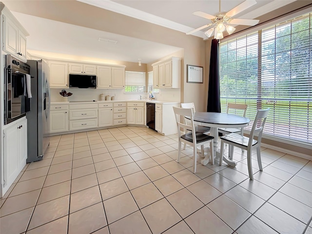 261 Colonial Cir, Athens, TX 75751 - kitchen featuring black appliances, light tile patterned flooring, a ceiling fan, light countertops, and crown molding