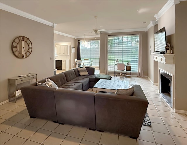 261 Colonial Cir, Athens, TX 75751 - living room with a ceiling fan, light tile patterned floors, crown molding, baseboards, and a fireplace
