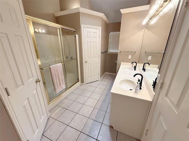 261 Colonial Cir, Athens, TX 75751 - full bath with tile patterned floors, a stall shower, double vanity, and baseboards