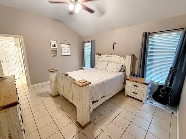 261 Colonial Cir, Athens, TX 75751 - bedroom with vaulted ceiling, light tile patterned flooring, and ceiling fan
