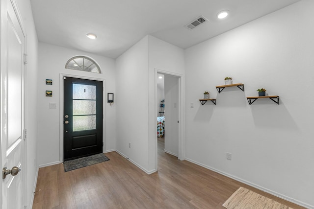 21411 Waldenburg Pl, Tomball, TX 77375 - foyer entrance featuring light wood finished floors, baseboards, and recessed lighting