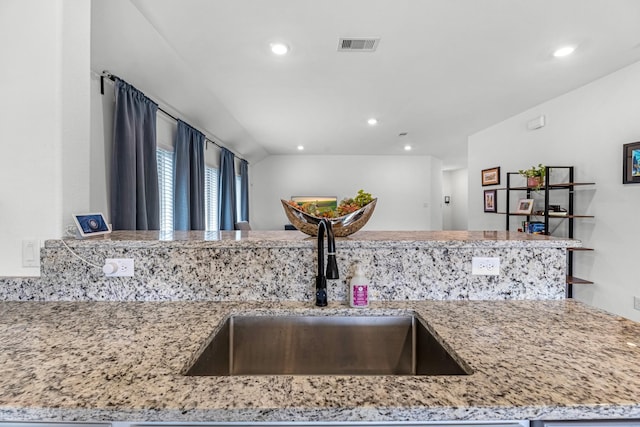 21411 Waldenburg Pl, Tomball, TX 77375 - kitchen featuring a sink, recessed lighting, and light stone countertops