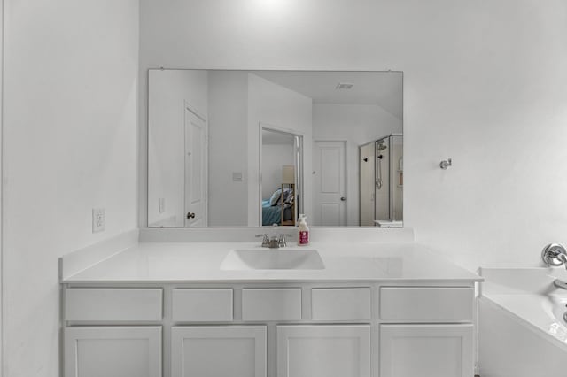 21411 Waldenburg Pl, Tomball, TX 77375 - ensuite bathroom with vanity, an enclosed shower, and a bathtub