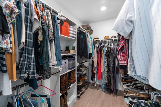 21411 Waldenburg Pl, Tomball, TX 77375 - spacious closet featuring wood finished floors