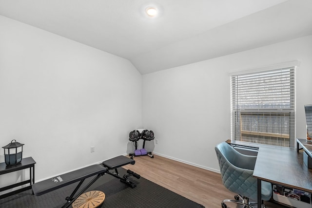 21411 Waldenburg Pl, Tomball, TX 77375 - office featuring wood finished floors, vaulted ceiling, and baseboards