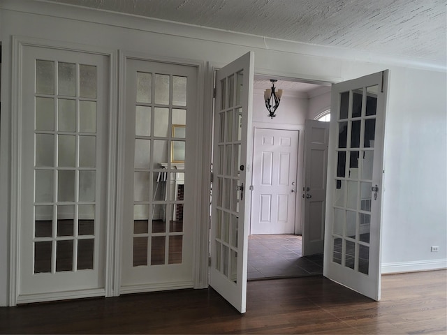 5806 Bayou Bend Ct, Houston, TX 77004 - doorway with french doors and dark wood finished floors