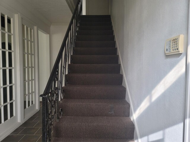 5806 Bayou Bend Ct, Houston, TX 77004 - stairs featuring tile patterned flooring