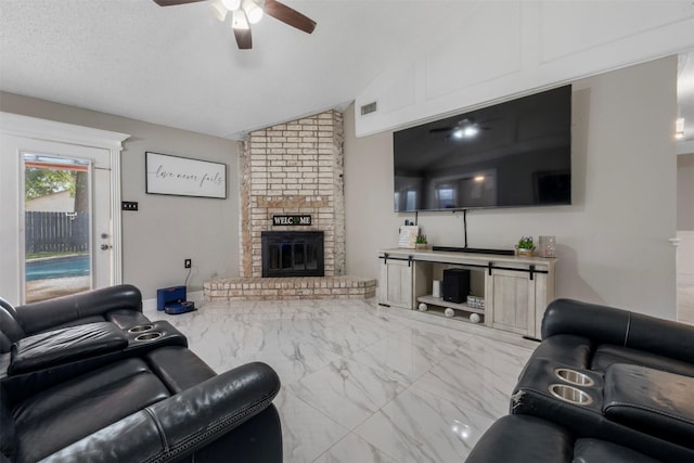 23334 Earlmist Dr, Spring, TX 77373 - living room with lofted ceiling, marble finish floors, a ceiling fan, and a brick fireplace