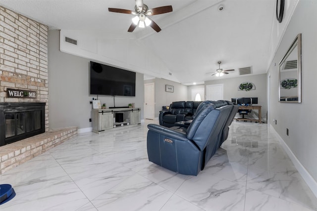 23334 Earlmist Dr, Spring, TX 77373 - living room with a ceiling fan, marble tiled flooring, a fireplace, vaulted ceiling, and an office area