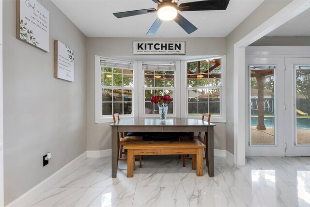 23334 Earlmist Dr, Spring, TX 77373 - dining space with plenty of natural light, baseboards, light marble finish flooring, and ceiling fan
