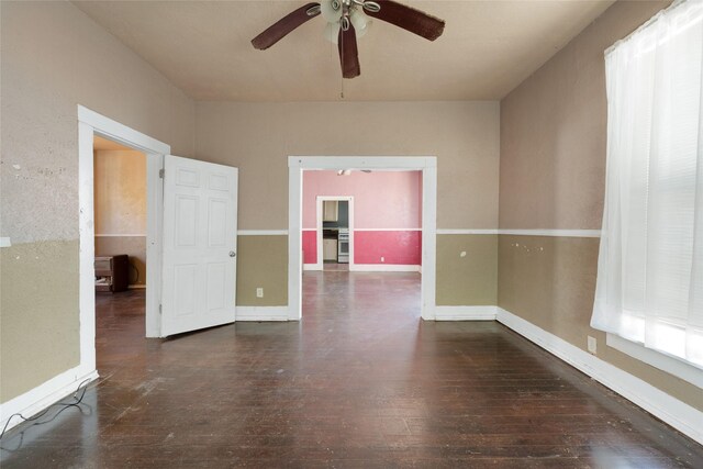 2005 Chestnut St, Houston, TX 77009 - unfurnished room with ceiling fan, hardwood / wood-style flooring, and baseboards