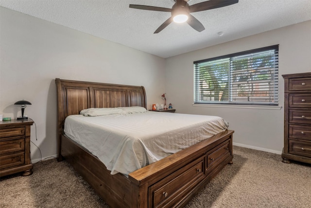 19414 Gooselake Ln, Houston, TX 77084 - bedroom with light carpet, a textured ceiling, ceiling fan, and baseboards