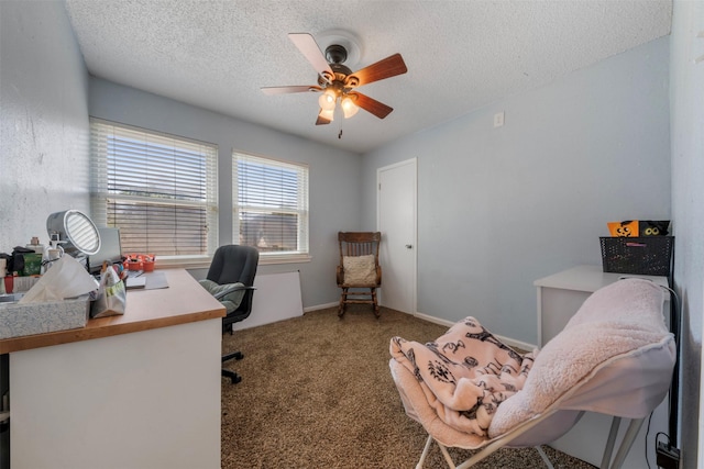 19414 Gooselake Ln, Houston, TX 77084 - home office featuring a textured ceiling, a ceiling fan, and carpet flooring