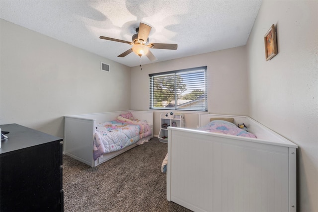 19414 Gooselake Ln, Houston, TX 77084 - carpeted bedroom featuring a textured ceiling and a ceiling fan