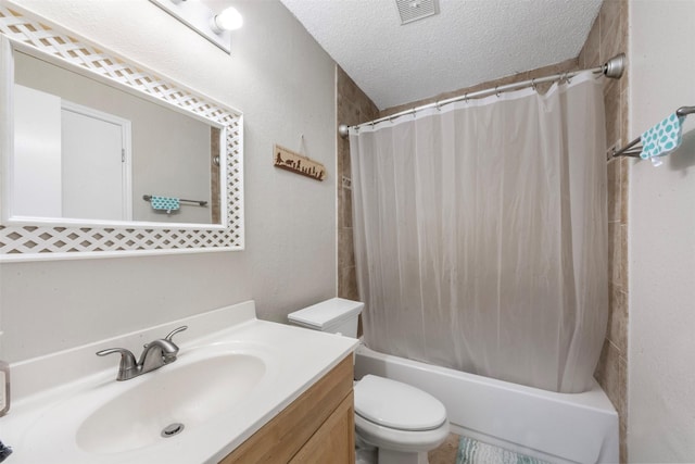 19414 Gooselake Ln, Houston, TX 77084 - bathroom with a textured ceiling, toilet, vanity, and shower / bath combo with shower curtain