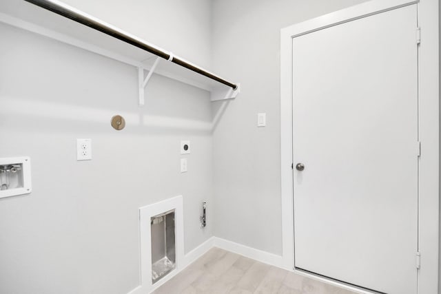 12027 Maple Oak Dr, Houston, TX 77066 - washroom with electric dryer hookup, hookup for a washing machine, baseboards, and hookup for a gas dryer