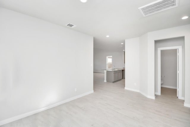 12027 Maple Oak Dr, Houston, TX 77066 - empty room with recessed lighting, baseboards, and light wood-style flooring