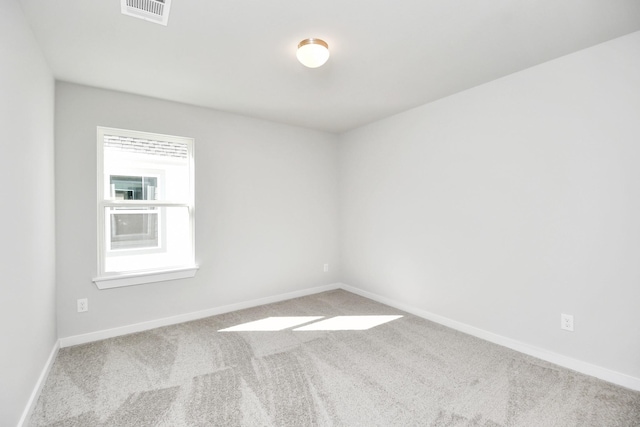 12027 Maple Oak Dr, Houston, TX 77066 - carpeted spare room featuring baseboards