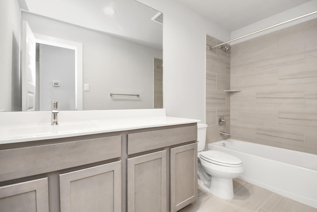 12027 Maple Oak Dr, Houston, TX 77066 - full bathroom featuring toilet, vanity, shower / bathtub combination, and wood finished floors
