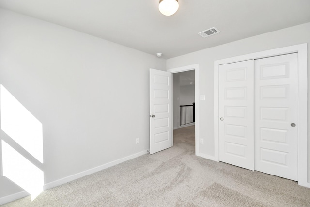 12027 Maple Oak Dr, Houston, TX 77066 - unfurnished bedroom featuring carpet, baseboards, and a closet