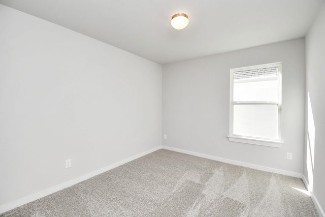 12027 Maple Oak Dr, Houston, TX 77066 - carpeted empty room with baseboards