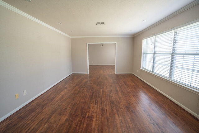 5507 W Bellfort Ave, Houston, TX 77035 - empty room with dark wood-style flooring, baseboards, and ornamental molding