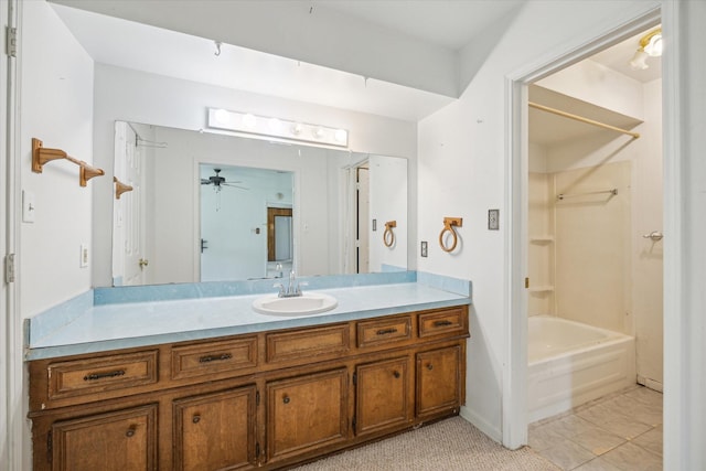 2718 Leichester Dr, Spring, TX 77386 - bathroom with a ceiling fan, vanity,  shower combination, and baseboards