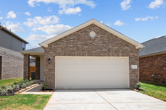 22606 Rosy Heights Trl, Tomball, TX 77377 - single story home with concrete driveway, brick siding, an attached garage, and a shingled roof