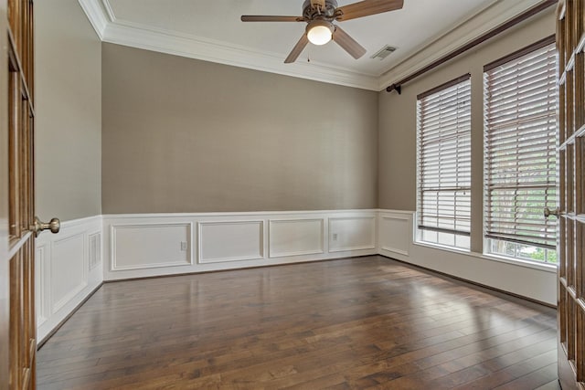 145 W Shore Dr, Montgomery, TX 77356 - empty room featuring a ceiling fan, ornamental molding, dark wood-style floors, and wainscoting