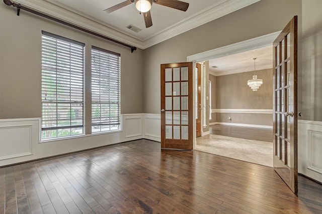 145 W Shore Dr, Montgomery, TX 77356 - spare room featuring french doors, ornamental molding, hardwood / wood-style flooring, a ceiling fan, and wainscoting