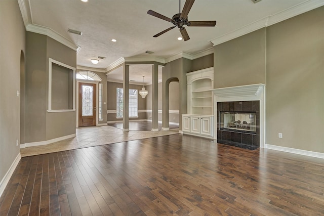 145 W Shore Dr, Montgomery, TX 77356 - unfurnished living room with baseboards, crown molding, ceiling fan, wood finished floors, and recessed lighting